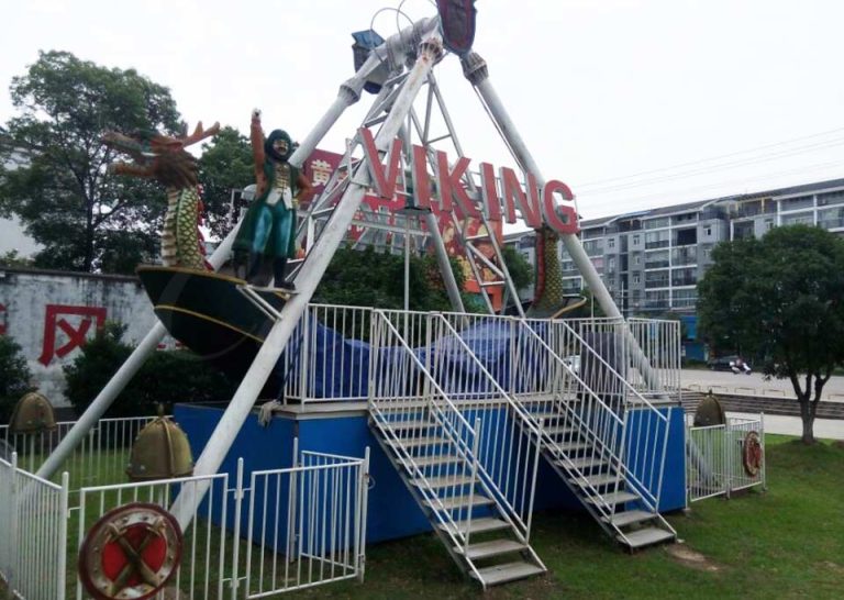16 seat Viking themed pirate ship ride installed in an outdoor amusement park