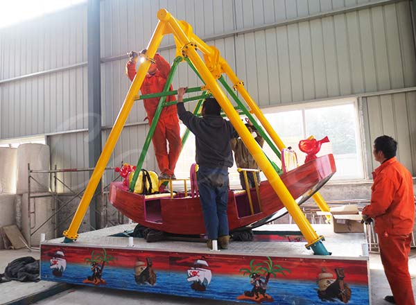Assembling Mini Pirate Ship Ride in africa