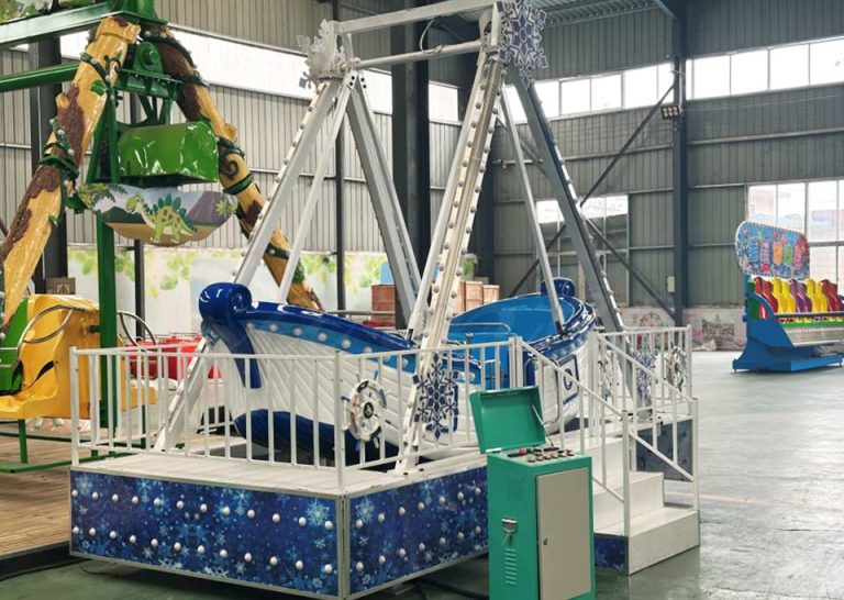 bule snow themed mini pirate ship ride