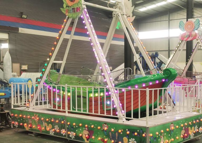 mini pirate ship amusement ride with colorful lights