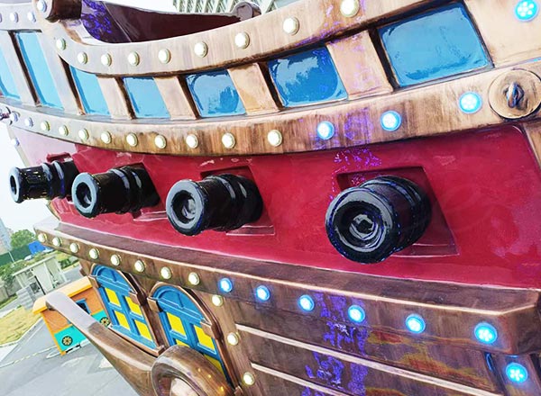 Decorative cannon and detailed fiberglass design of 40 seat pirate ship amusement ride