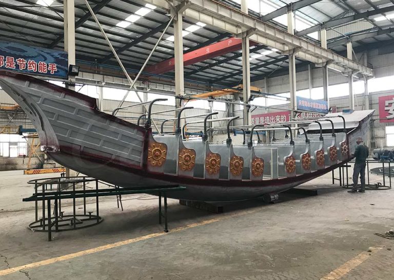 Fiberglass cabin body production of 40 seat pirate ship amusement ride in factory