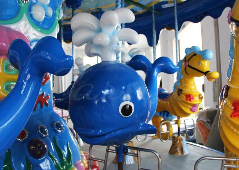 Blue whale-themed carousel seat in cartoon style, highly attractive and child-friendly.