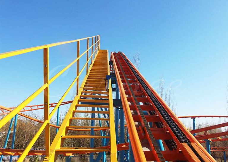 Downward view from family roller coaster track, highlighting exciting family coaster experience.