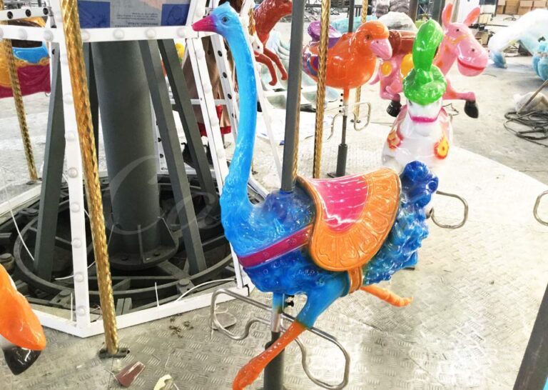 Vibrant blue ostrich seat on amusement carousel – unique animal-themed ride for theme parks and malls