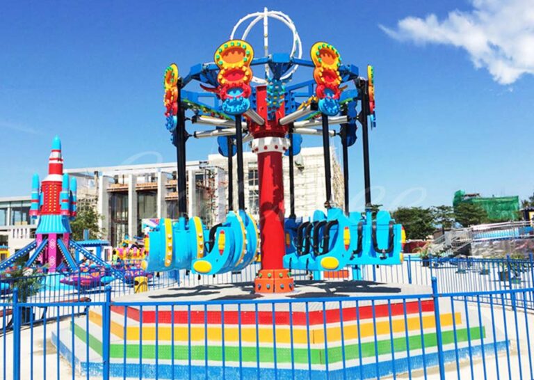 Outdoor installation of the Airborne Shot amusement ride with colorful lights and a fun atmosphere, ready to provide thrilling experiences.