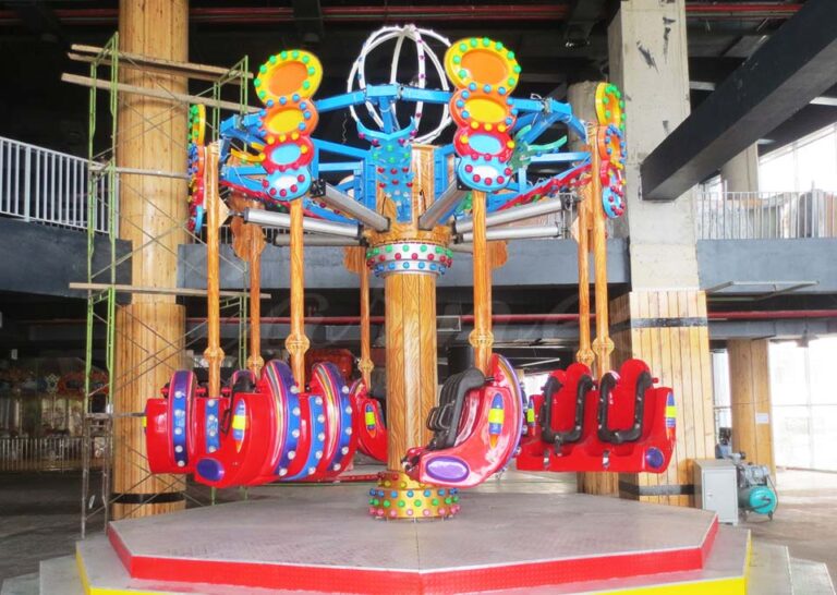 Airborne Shot ride featuring bright, colorful seats and eye-catching LED lights, designed for maximum excitement.