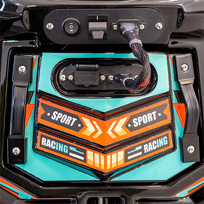 Close-up of the rear section of the Anmi Kids Go-Kart showing the power switch and sport racing graphic design