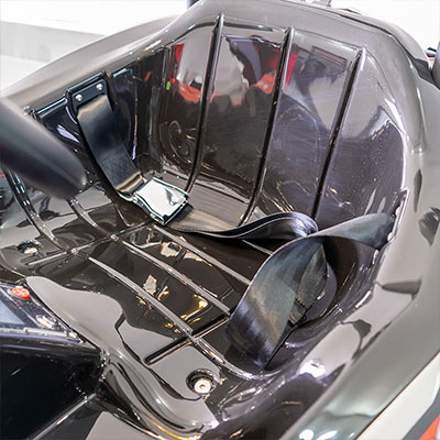 Close-up of the Anmi Kids Go-Kart's seat with a 2-point safety belt, providing secure and comfortable seating for young drivers