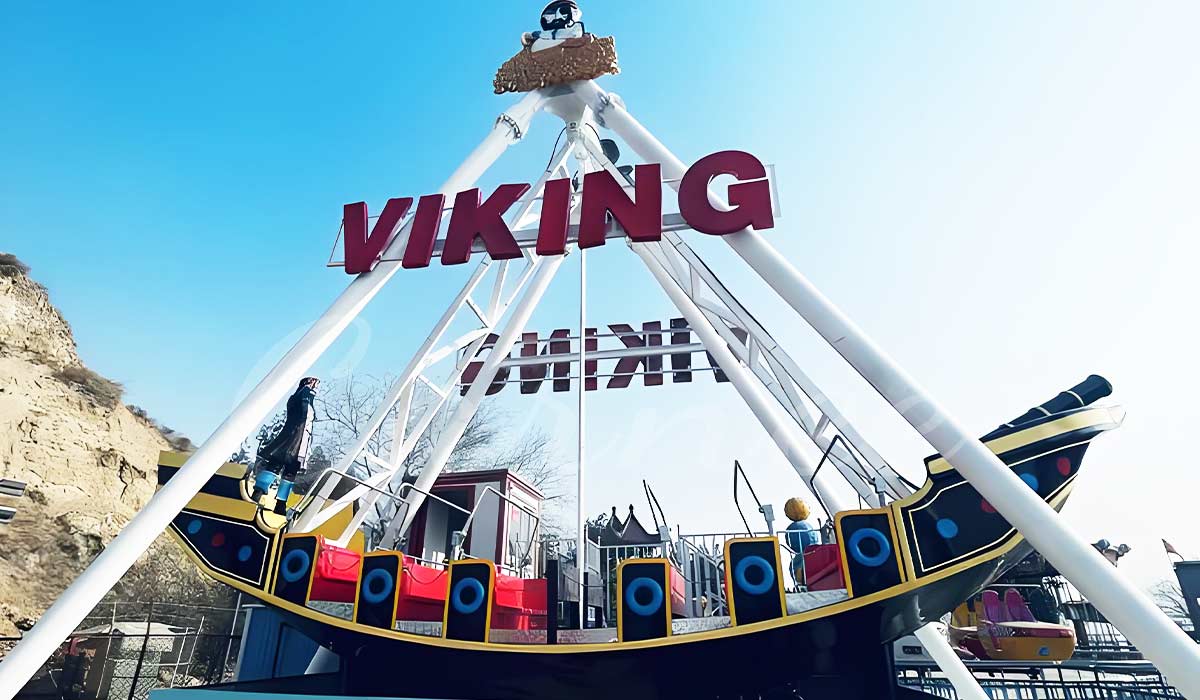 Viking ship ride in full swing at an amusement park, showing passengers enjoying the thrill under a clear blue sky