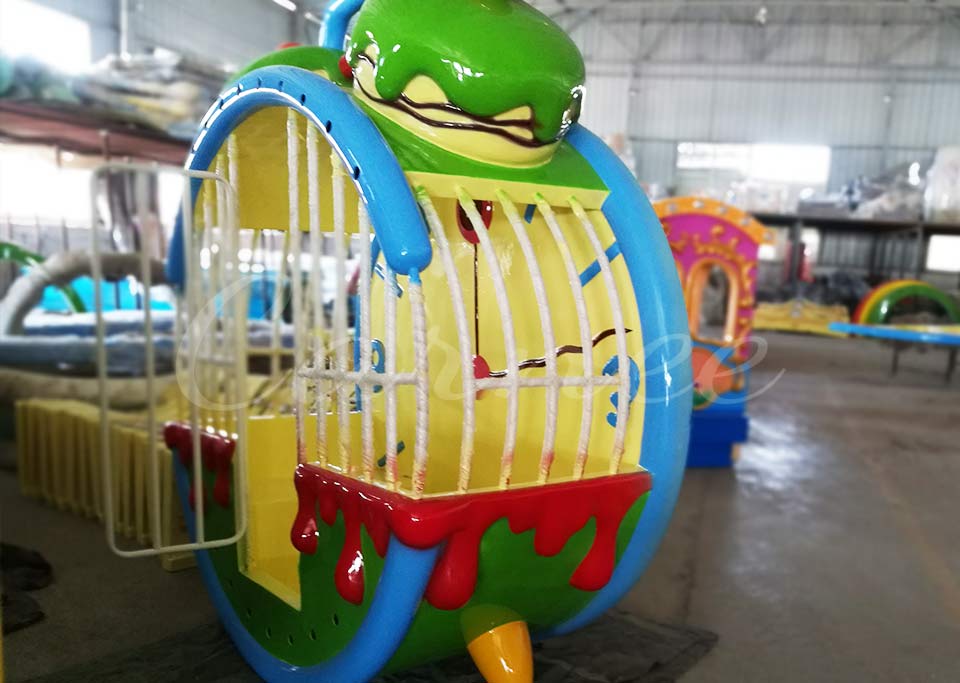 Brightly painted and themed mini ferris wheel cabin ready for assembly in factory