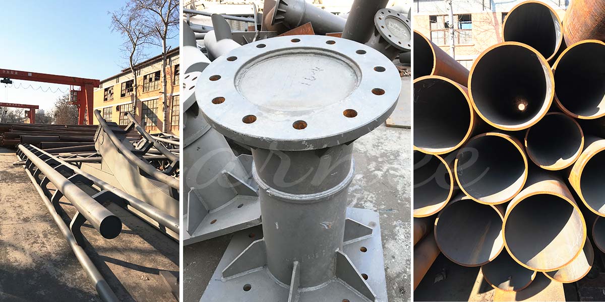 Steel components of a Ferris wheel, including support structures and pipes, ready for assembly.
