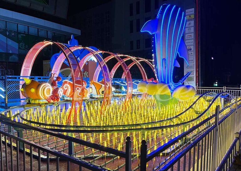 Ocean theme mini roller coaster with various animal-shaped cabins for kids and family, manufactured by Carnee Rides