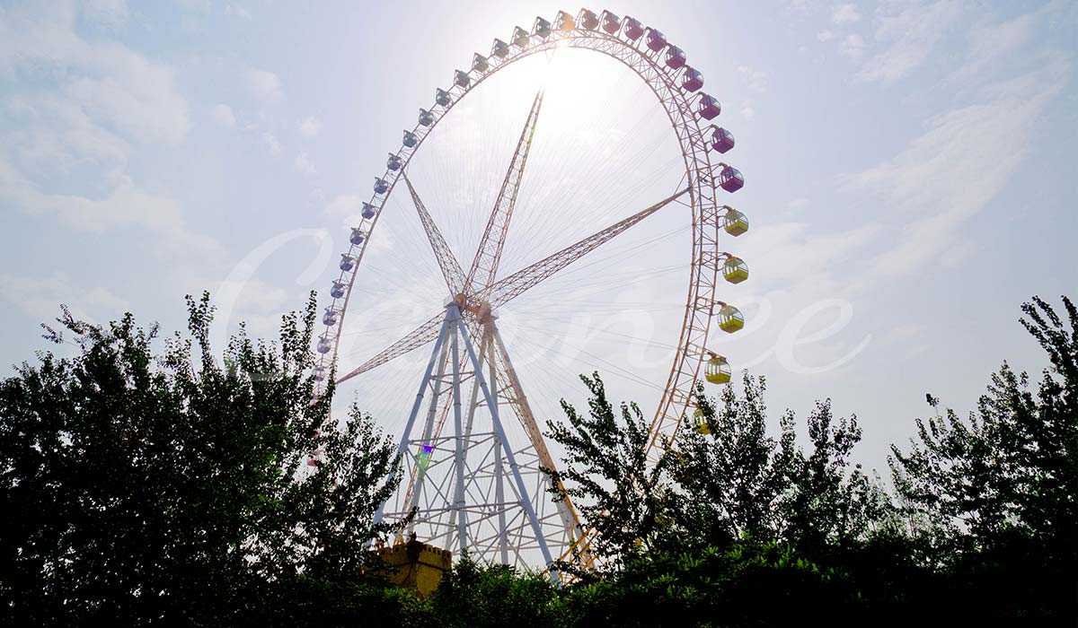 Large Ferris wheel against a sunny sky, providing a panoramic view of the surrounding landscape.