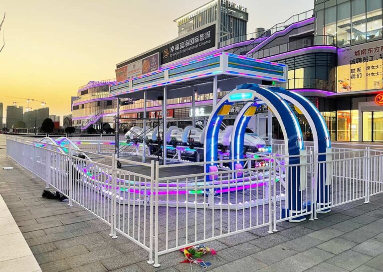 High-speed train roller coaster at the shopping center with modern lighting and design.