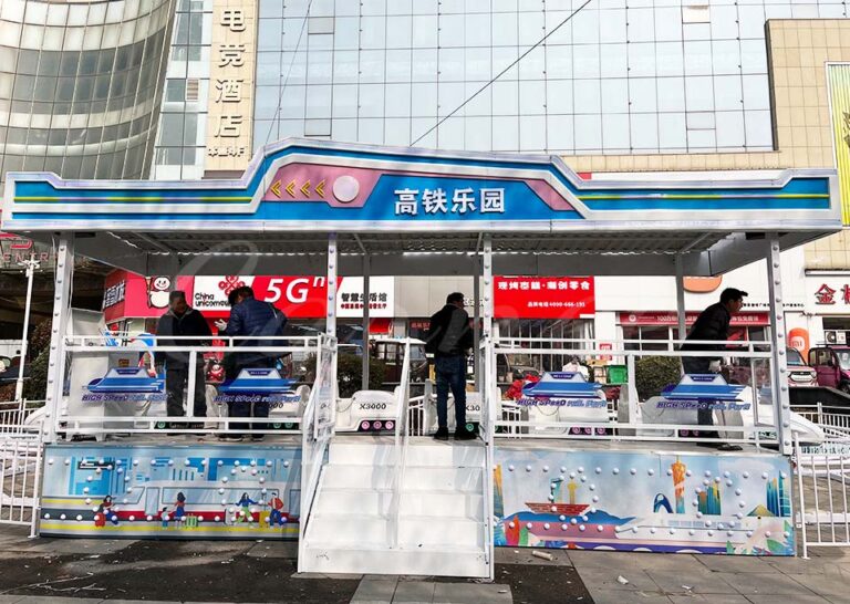 Visitors experience the high-speed train roller coaster ride in a vibrant park.