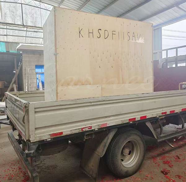 Mechanical bull ride packed in a strong wooden crate, loaded on a truck and ready for international shipping.