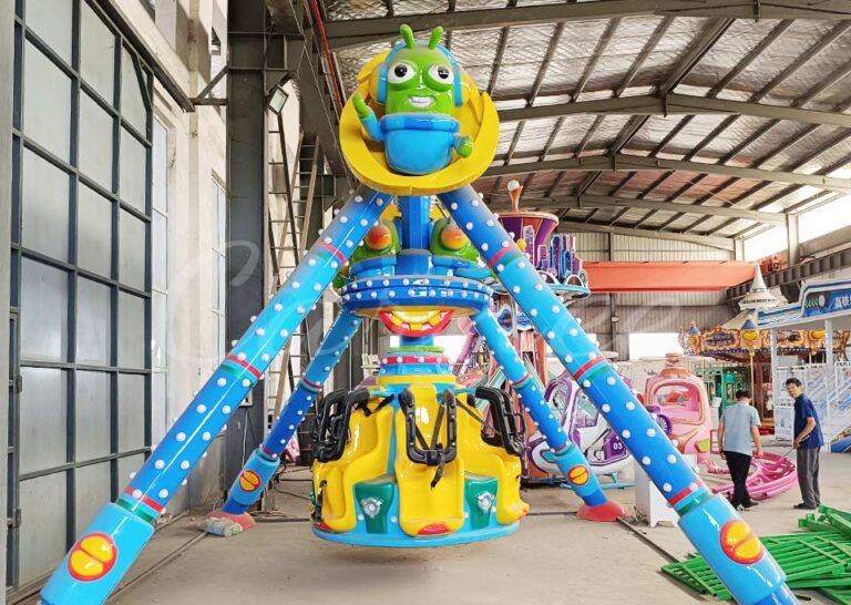Mini Pendulum Ride designed for kids, featuring bright colors, cartoon alien characters, and 6 Seat Pendulum Rides for small groups in amusement parks
