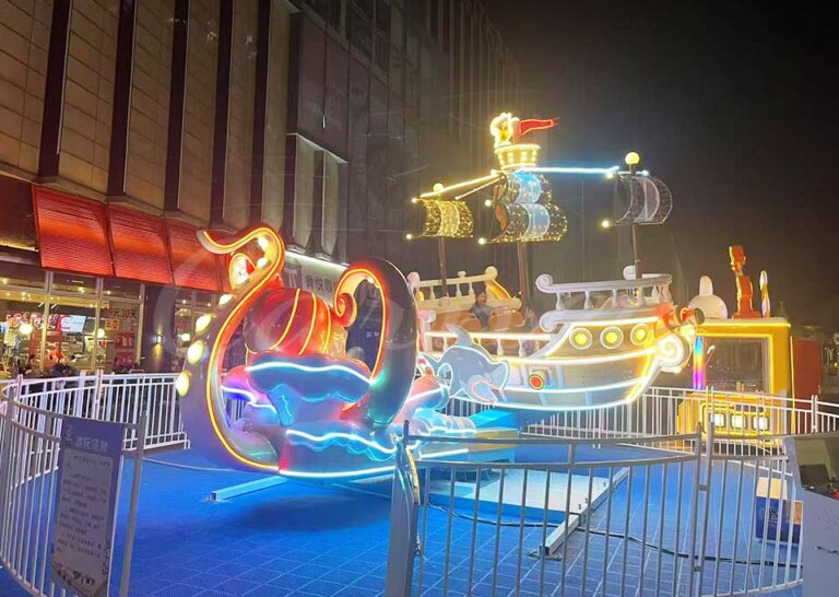 Outdoor octopus pirate ship ride with LED lighting, perfect for amusement parks and family entertainment centers.