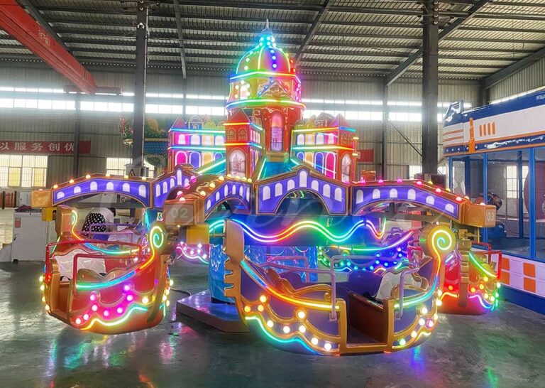 Venetian boat ride with rotating boats and colorful lights for family fun at theme parks and carnivals