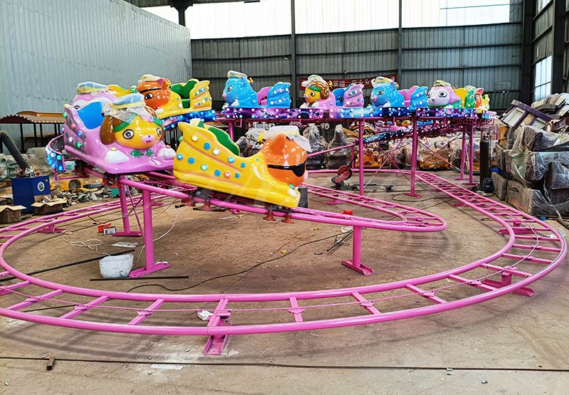 Mini space shuttle roller coaster ready for shipment to Ethiopia, factory test at CARNEE Rides, 12 animal themed cabins