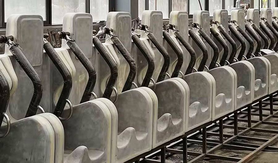 18 seats Miami Trip Ride fiberglass seat frames neatly arranged, highlighting sturdy structure and safety for amusement park rides.