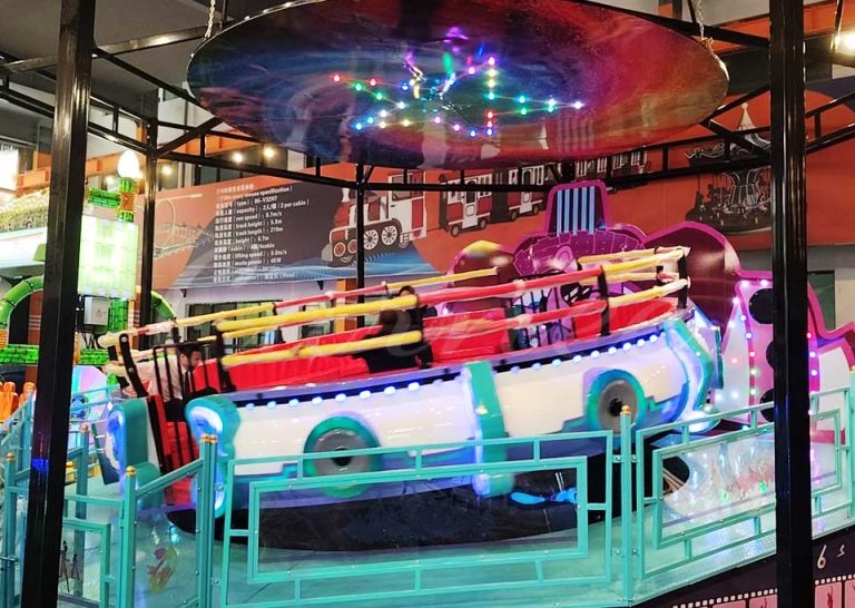 Indoor Electric Disco Tagada Ride with glowing LED lights and rotating motion, designed for high-energy indoor venues.