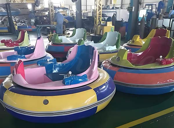 Round inflatable bumper cars with dual seats and bright colors for kids and adults.