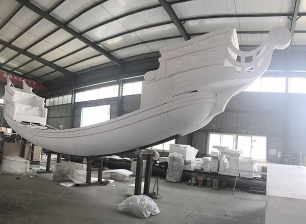 Fiberglass Viking ship ride body frame in Carnee Rides production workshop