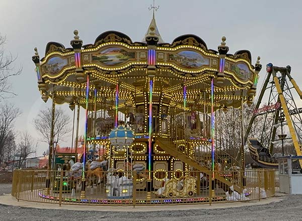 coste del carrusel de dos pisos