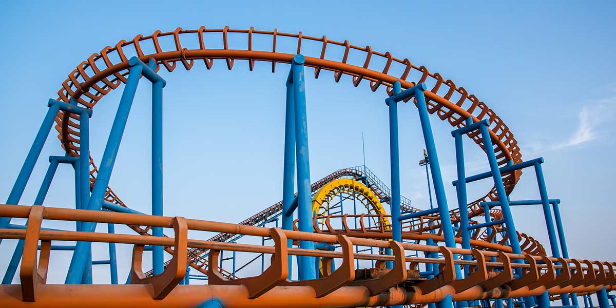 Close-up of roller coaster track during regular maintenance and safety inspection.