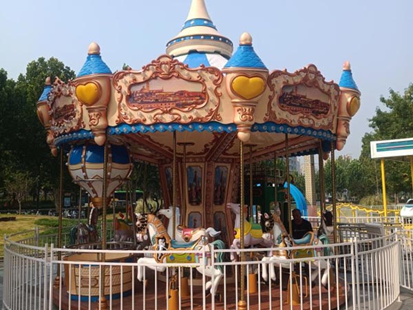 Luxury 16 seats carousel fully installed in Yemen park, showing completed merry-go-round structure with decorated horses.
