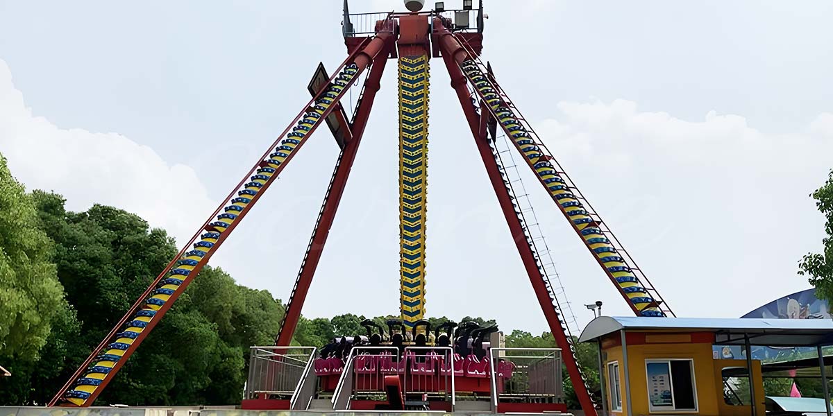 24-seater pendulum ride with steel frame structure in an outdoor amusement park.