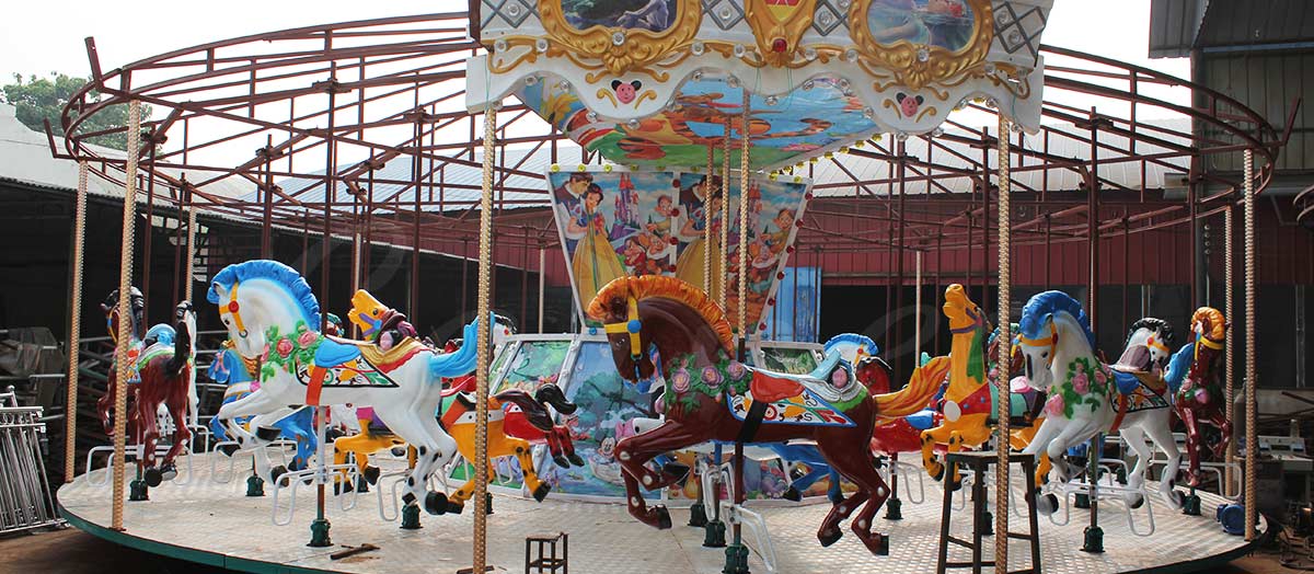 Construction phase of the 48 Seats Double Decker Carousel in Russia, showing the installation of the horses and structure.