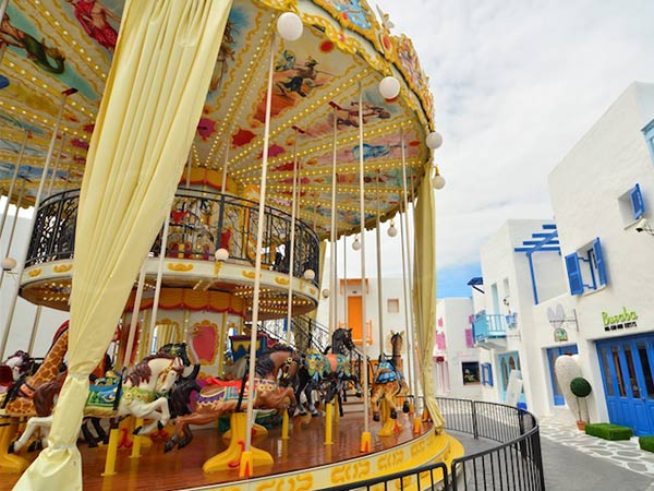 Indoor view of the 48 Seats two story carousel amusement ride with colorful horses and ceiling design.