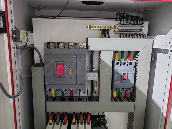 The electrical system of the 40-seat Pirate Ship ride being installed at Carnee Rides’ factory, ensuring safety and optimal operation.