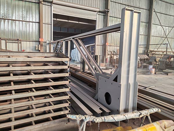 Carnee Rides engineers assembling the frame of the custom 40-seat Pirate Ship ride in our factory before delivery to Russia.