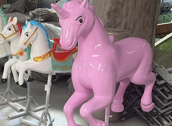 Pink unicorn carousel horse for kids' merry-go-round ride at carousel factory carnee rides