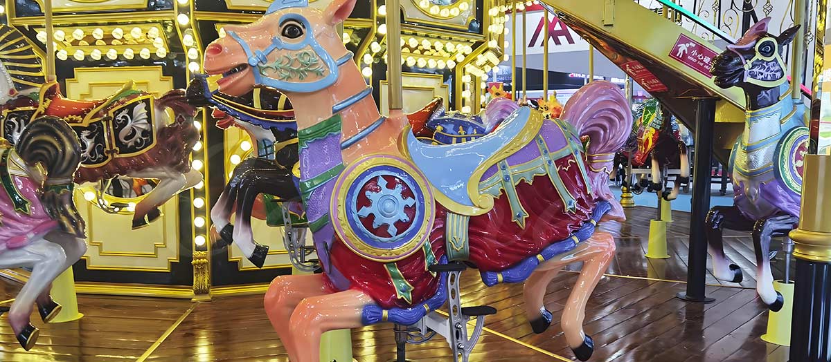 Close-up of the beautifully decorated horses on the 48 Seats Double Decker Carousel Carnival Ride