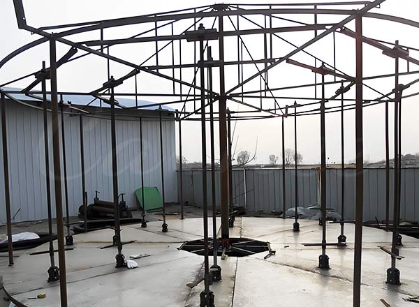 Double decker carousel foundation frame under construction showing the structural base before installation