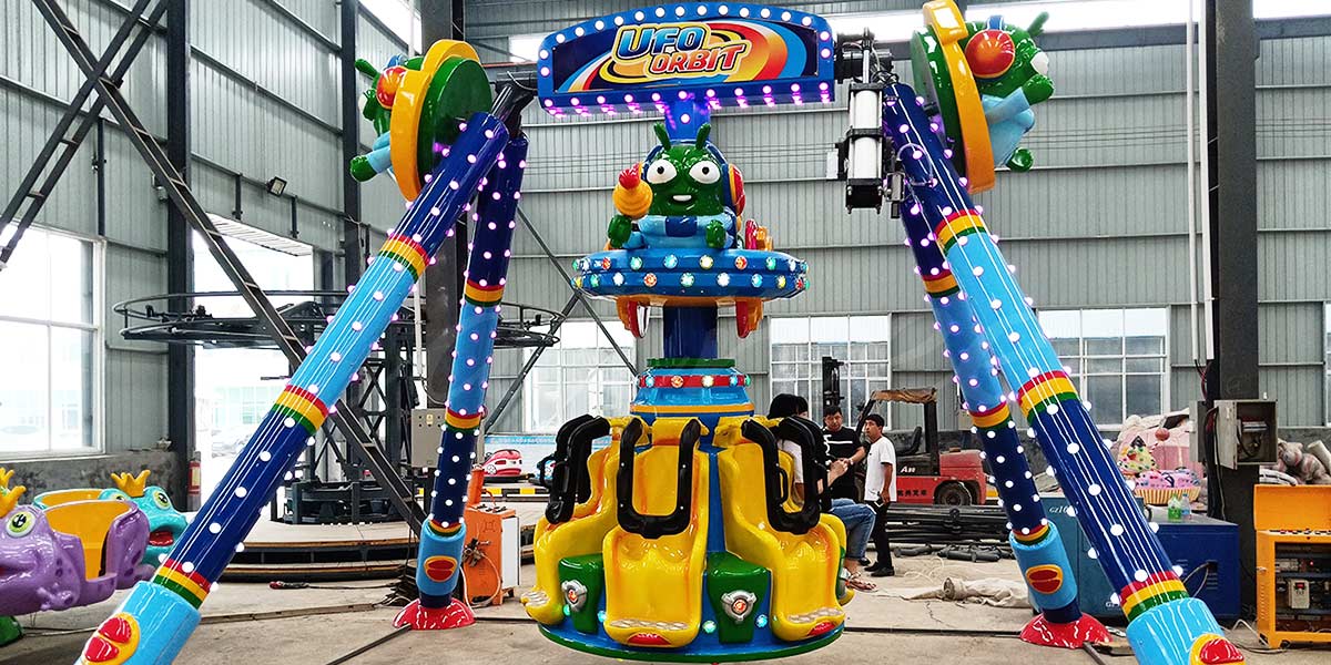 Mini pendulum ride with colorful lights designed for children, suitable for small amusement parks or indoor centers.