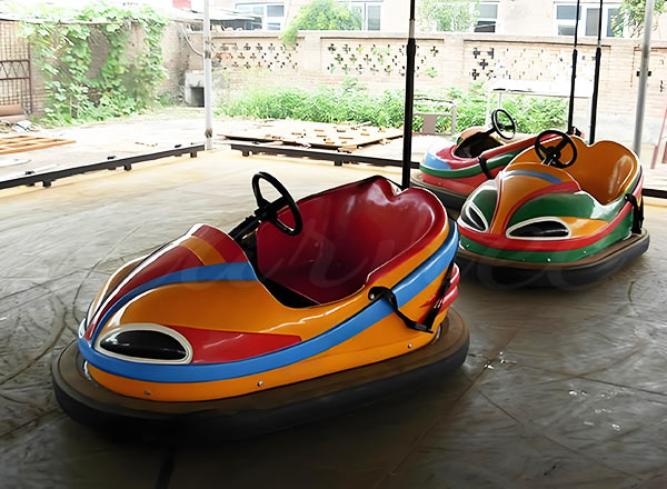 Commercial ceiling bumper car installation showing ceiling power grid system